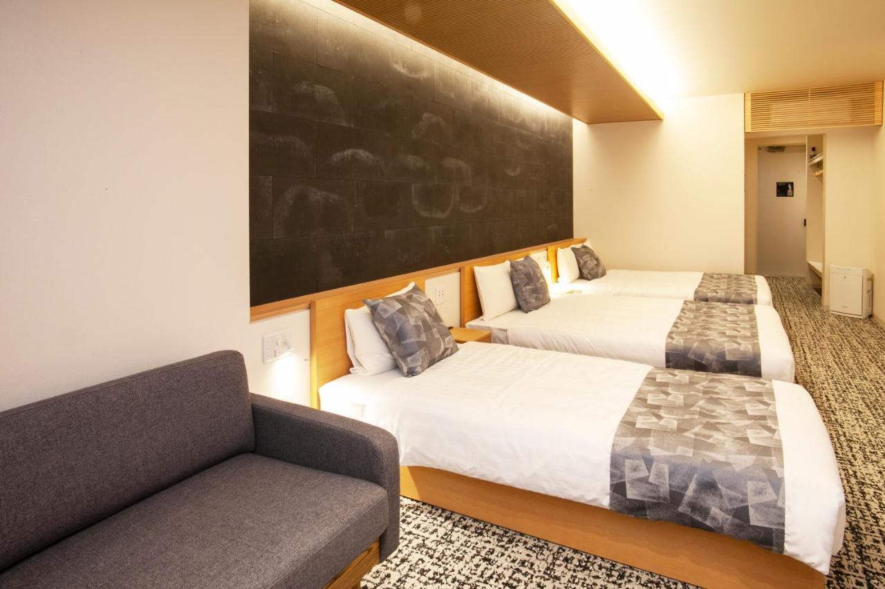 Grand Base Osu Aparthotel Nagoya Bagian luar foto