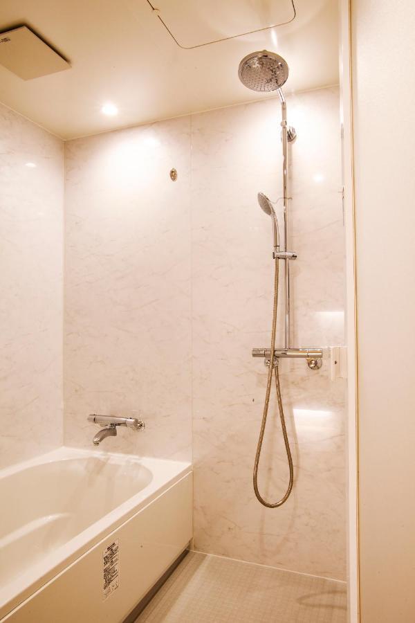 Grand Base Osu Aparthotel Nagoya Bagian luar foto