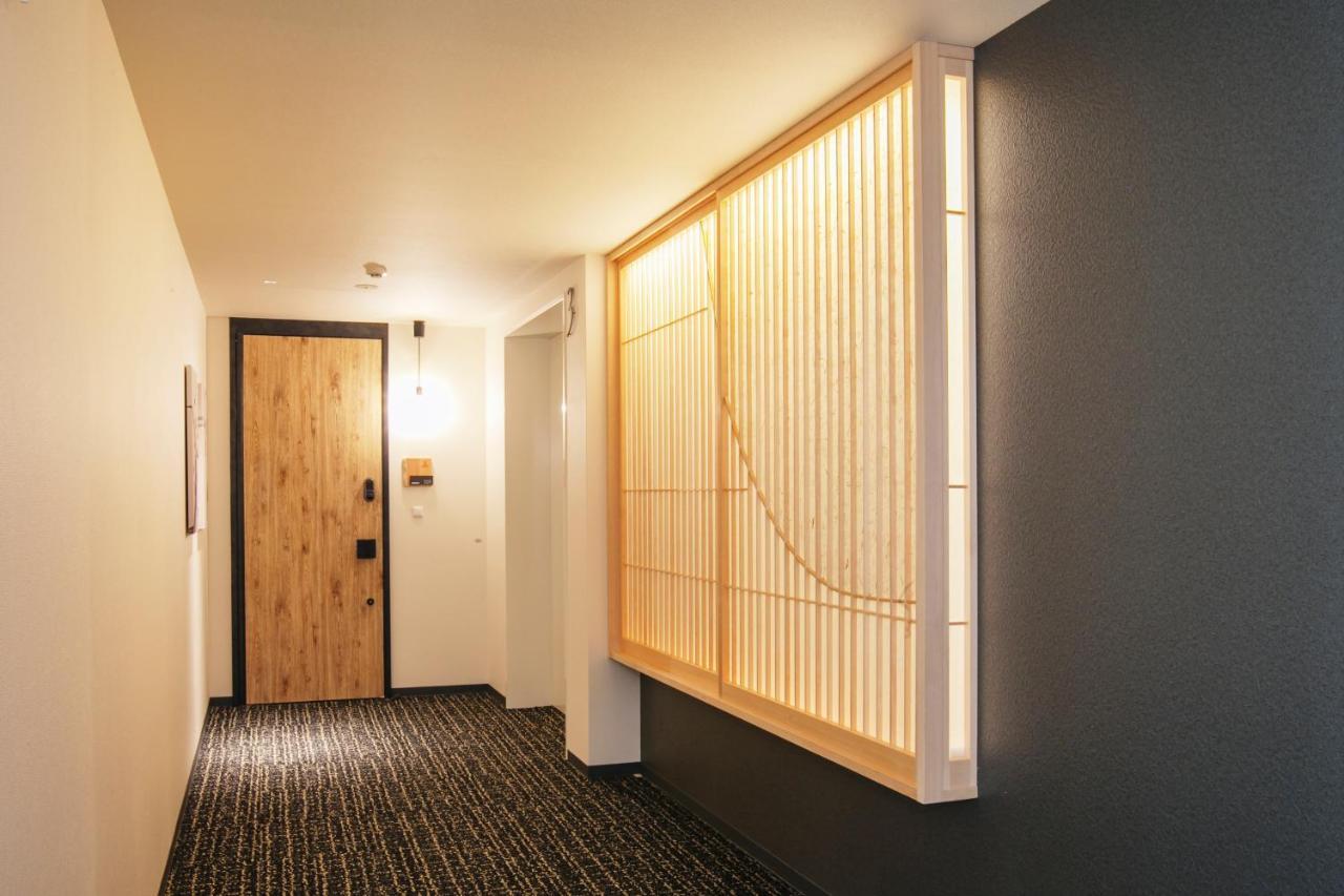 Grand Base Osu Aparthotel Nagoya Bagian luar foto