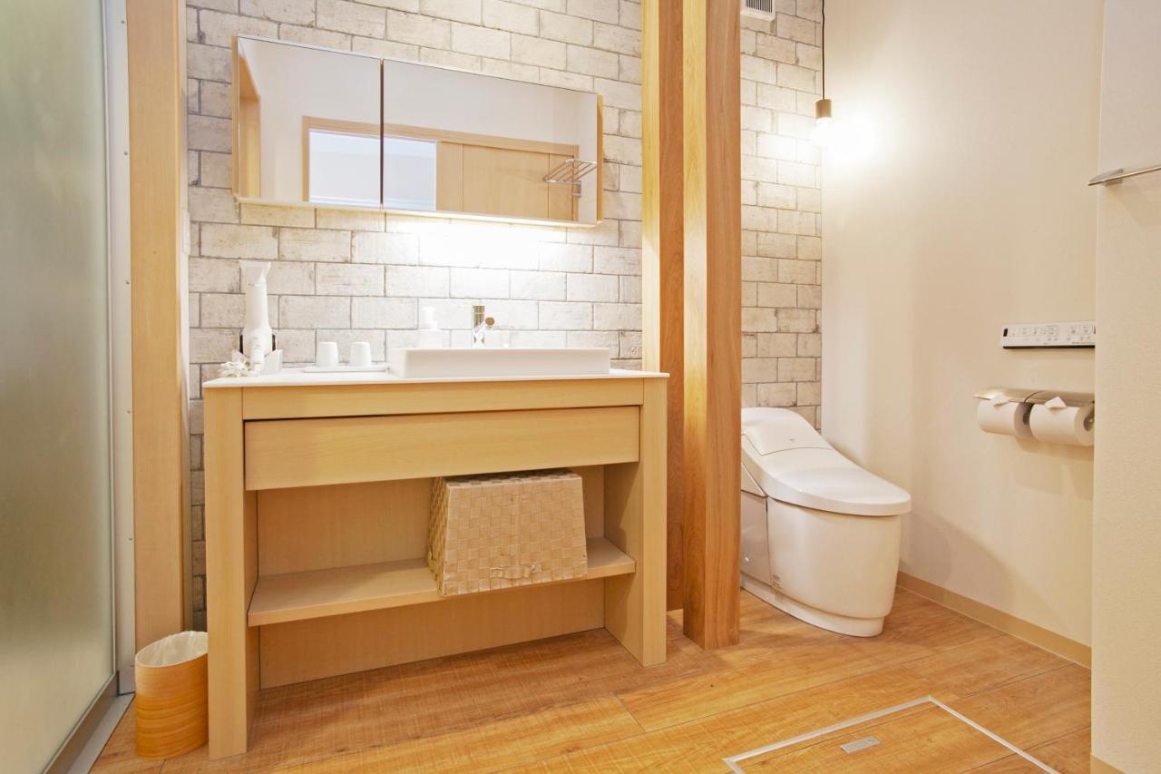 Grand Base Osu Aparthotel Nagoya Bagian luar foto