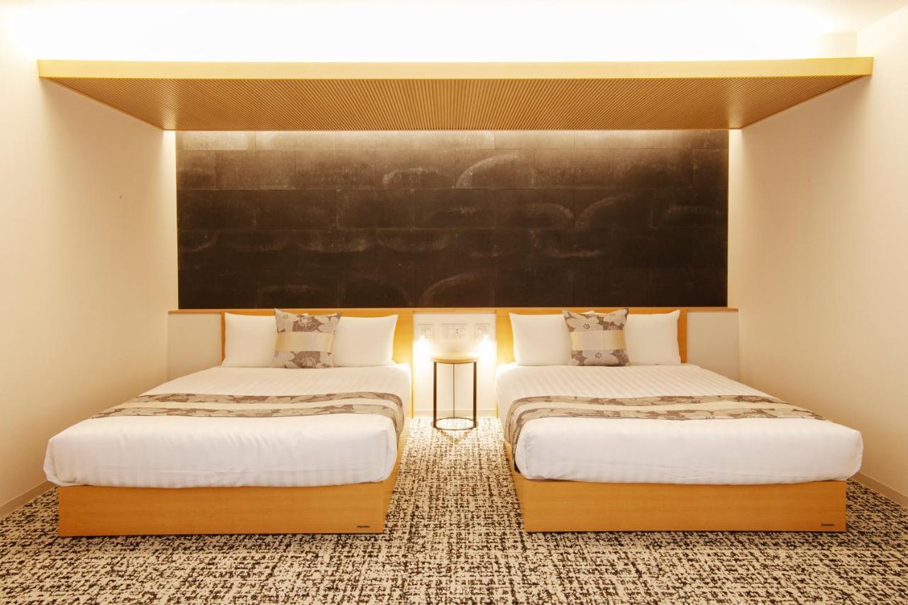 Grand Base Osu Aparthotel Nagoya Bagian luar foto